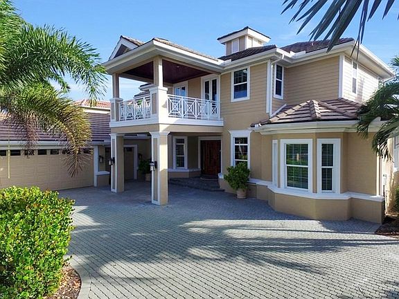 This Luxury home is Sold Turnkey with all the conveniences of a smart home technology. All windows and doors recently replace with PGT Windgurad Impact resistant.