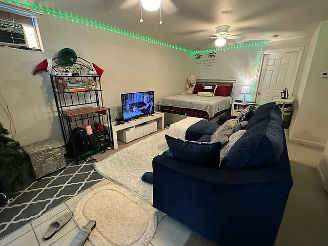 Large studio offers plenty of space for Queen size bed and living room area,