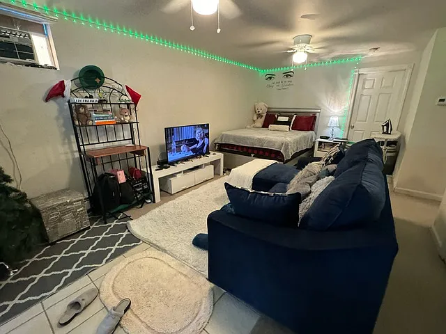 Large studio offers plenty of space for Queen size bed and living room area,
