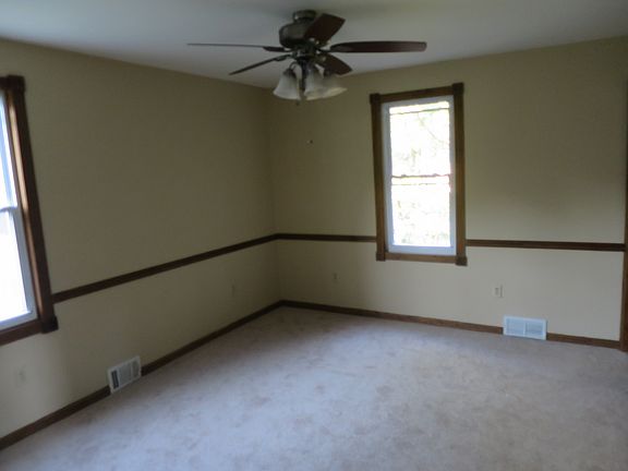 large well lit dining rm