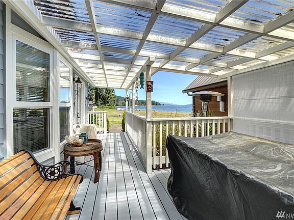 Enjoy the view rain or shine on the covered deck.