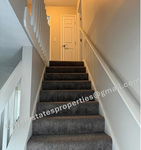Stairs to 2nd floor off Family Room