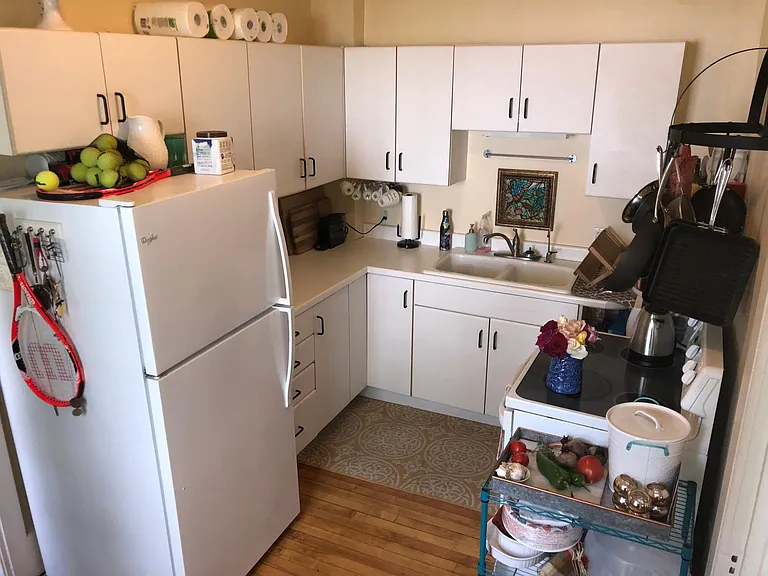 Kitchen - lots of cabinets, new electric stove, reverse osmosis water treatment system, hardwood floors.