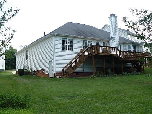 Deep back yard (note full size door to huge crawl space)