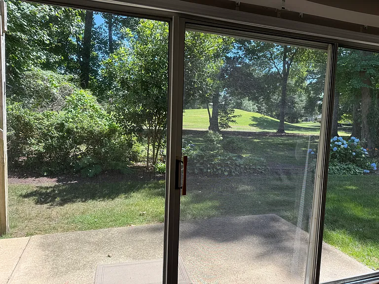 View of putting hole from Great room large sliding glass door