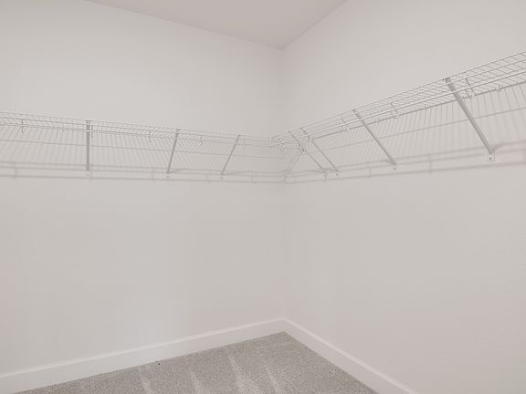 Primary suite walk-in closet