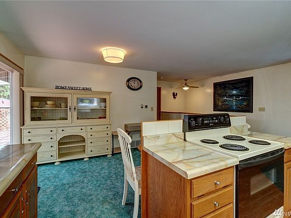 The dining area sits adjacent to the kitchen. 