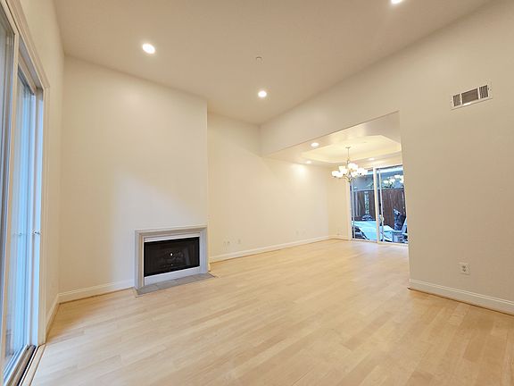 High Ceiling Living Room with a Fireplace
