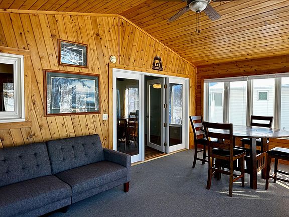 Large 4 seasons room with baseboard heating for year round. Also has an TV in this room