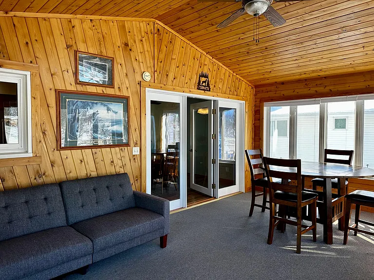 Large 4 seasons room with baseboard heating for year round. Also has an TV in this room