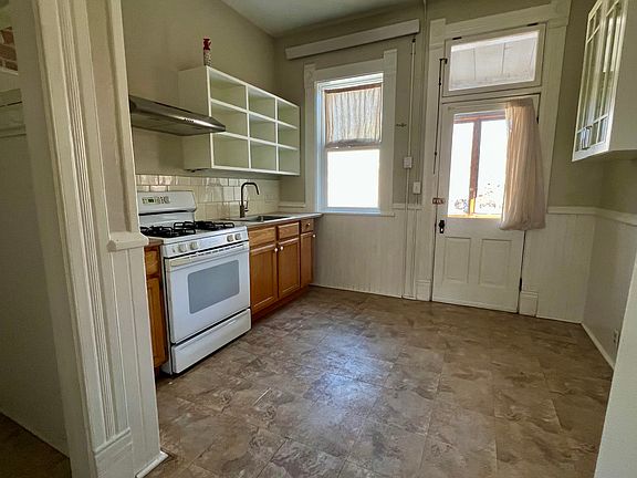 Kitchen with door to screened-in porch