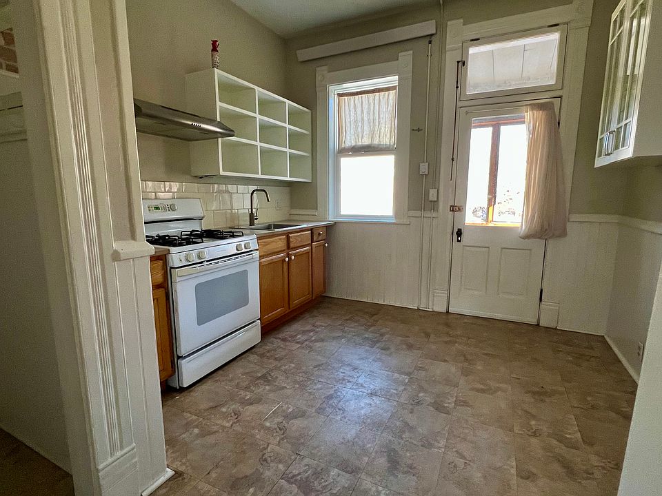 Kitchen with door to screened-in porch