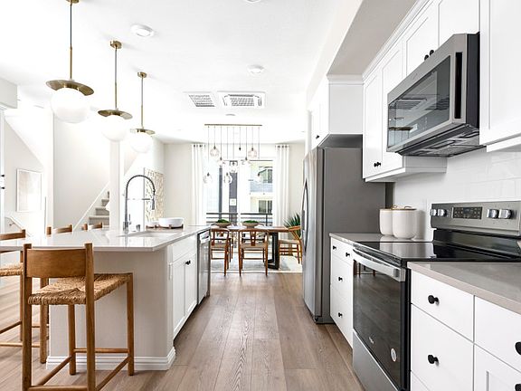 Sunlit kitchen with plenty of storage