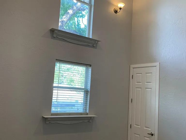 Large second bedroom with vaulted ceilings