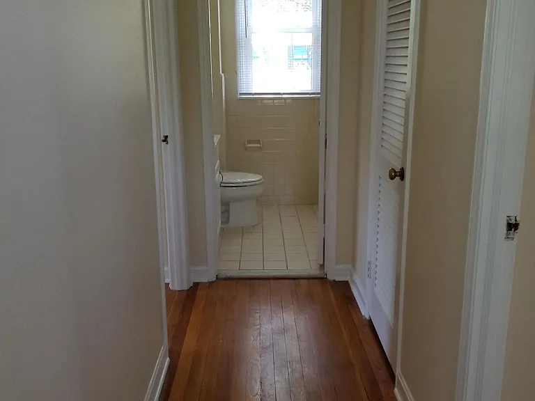 Upstairs hallway looking towards full bathroom