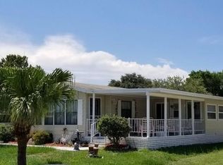908 Cypress St, Barefoot Bay, FL 32976