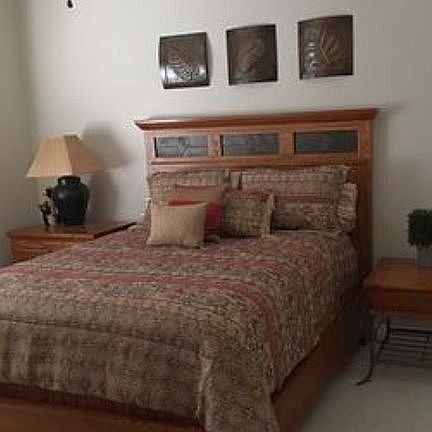 Queen bed in guest room