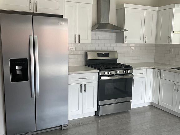 Kitchen _ Rent includes a stainless steel refrigerator with ice maker and water filter.