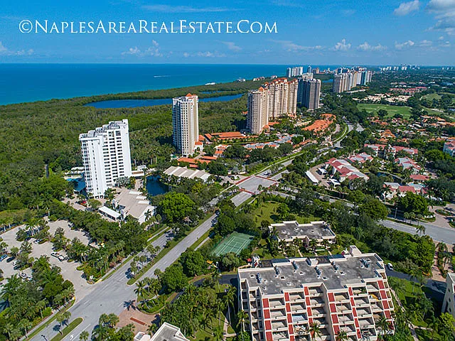 Valencia (right side, middle of photo) is on the corner at the intersection of Pelican Bay Blvd. and Gulf Park Drive, with the red tile roofs.