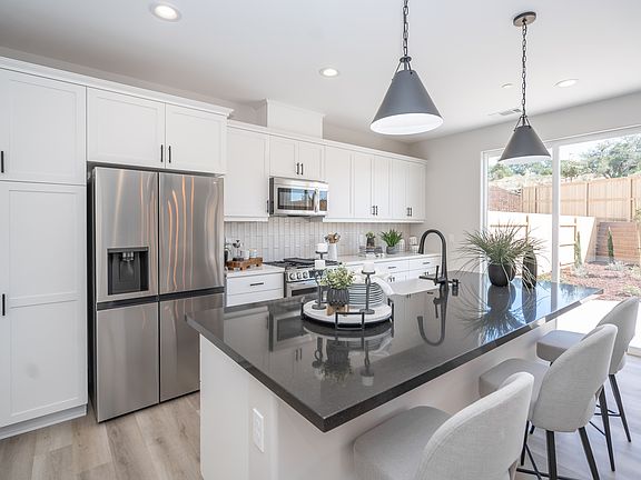 Pictures shown are of the model home. Actual home is under construction and finishes may vary.