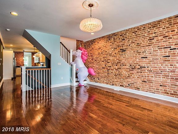 Living Room  And gleaming hardwood floors...