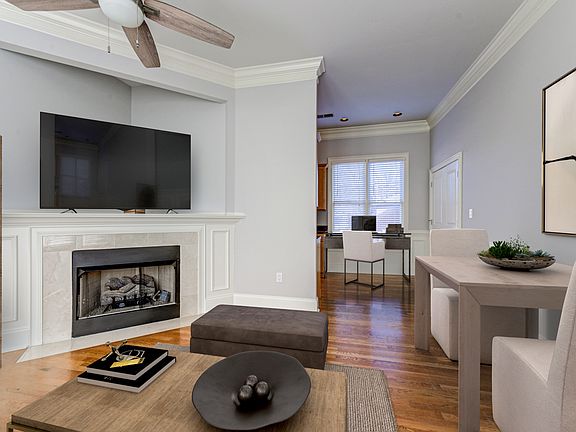 Living room leads to breakfast nook, laundry room (washer/dryer included), and kitchen