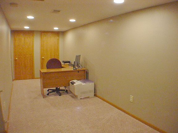Second family room area with 3/4 bath and utility room.