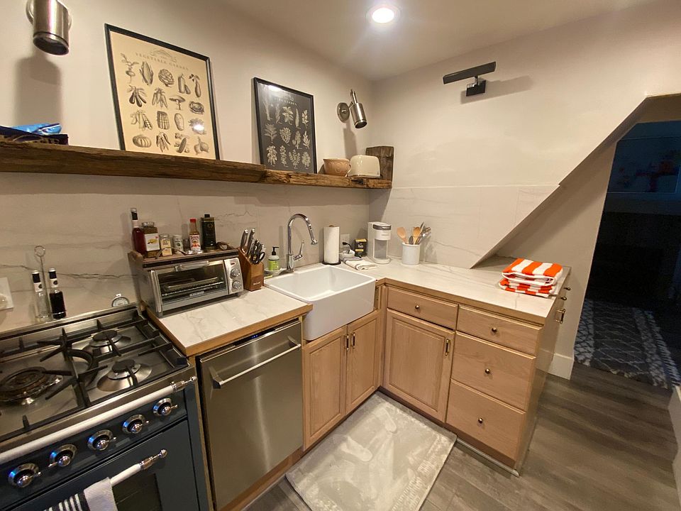 Kitchen complete with dishes, pans, pots, silverware, baking