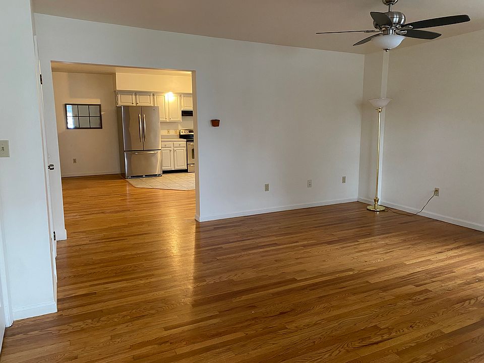 Looking from front door through living room to kitchen