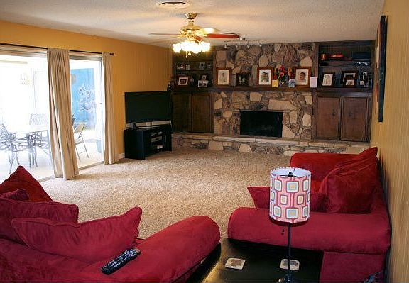 Large family room with rock fireplace