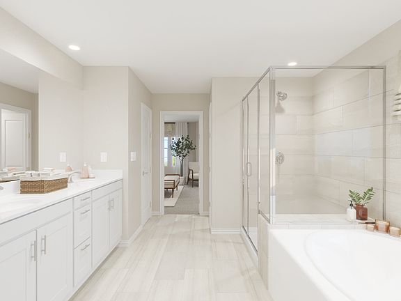 Treat yourself to a primary suite that inspires serenity