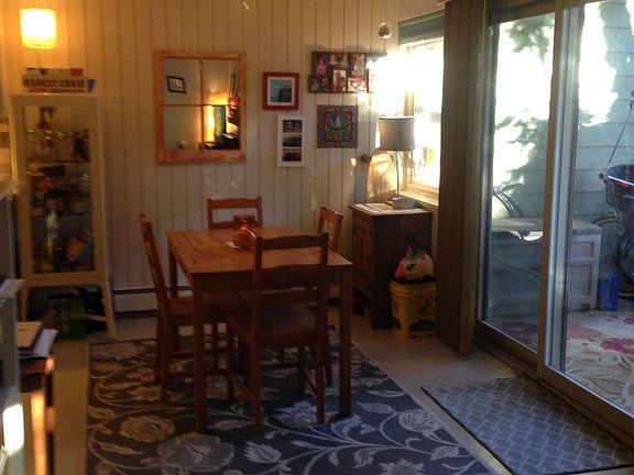 Dining area off of kitchen and sliding doors to patio and garden area