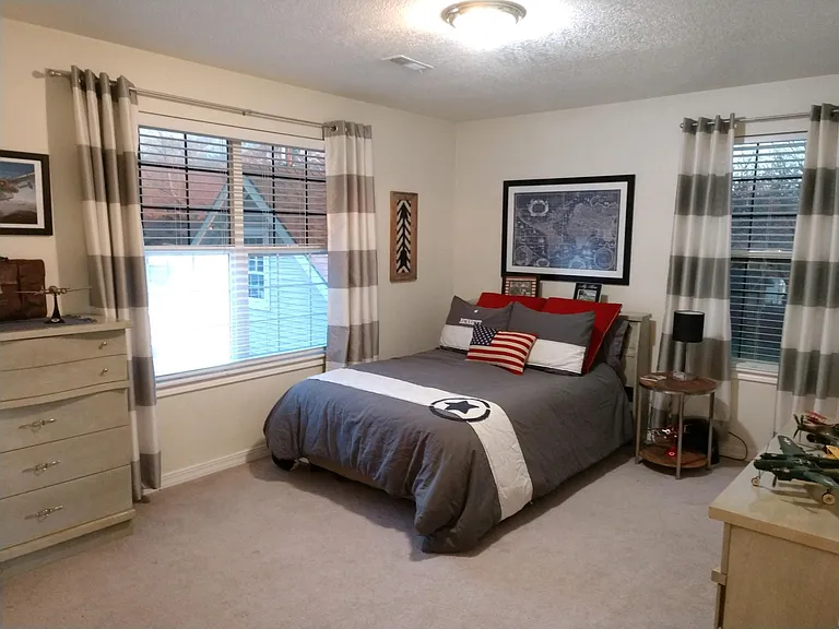 East bedroom on second floor. Has great view of mountains out the east window.