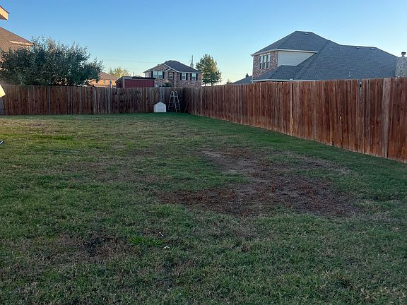 Huge back yard for playing around and hosting.