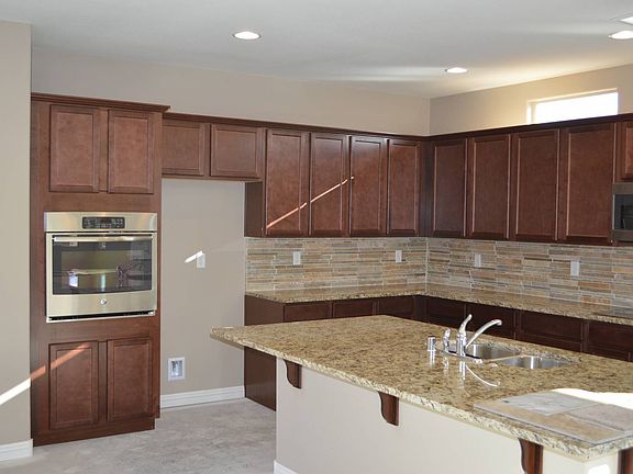 ElevationHomesite 52 features a spacious island kitchen.