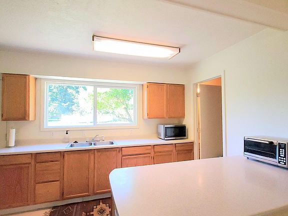 The kitchen island has plenty of storage.