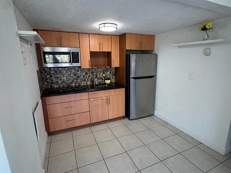4301 NW South Tamiami Canal Dr #304 — Photo 14
