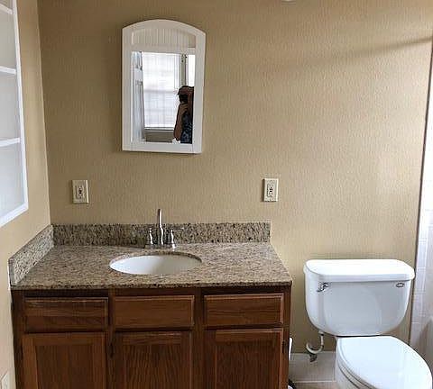 Nice Size Bathroom, Granite Top Vanity with Built In Shelves