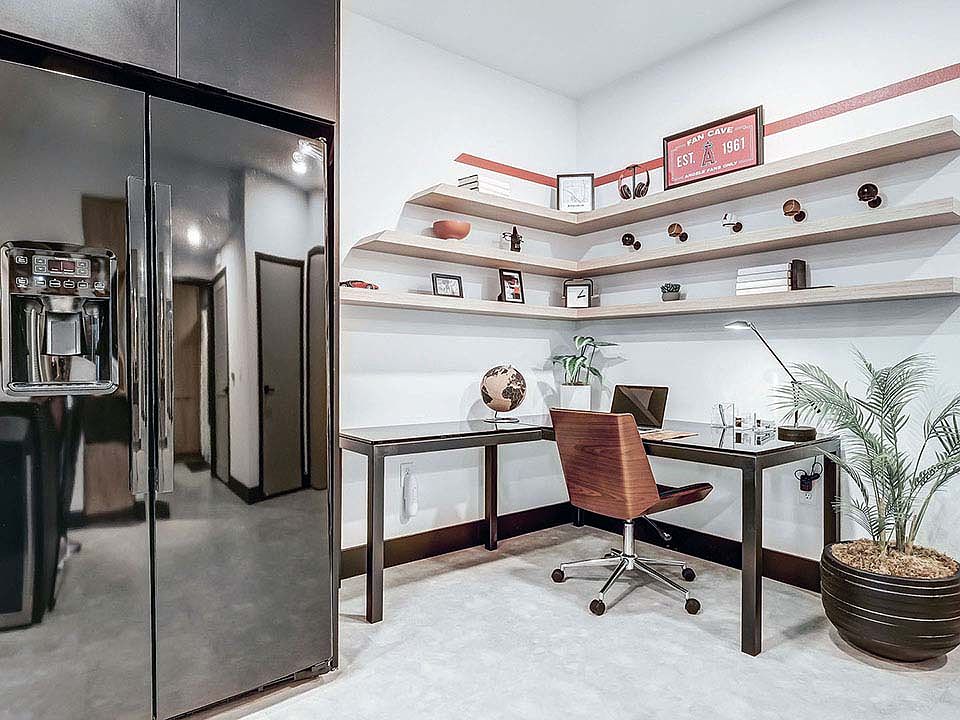 Griffis Platinum Triangle desk area with built in shelves.