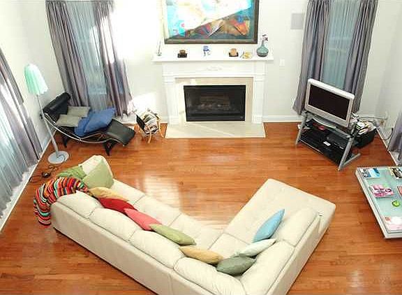 2 Story Family Room with Gas Fireplace and Hardwood Floors