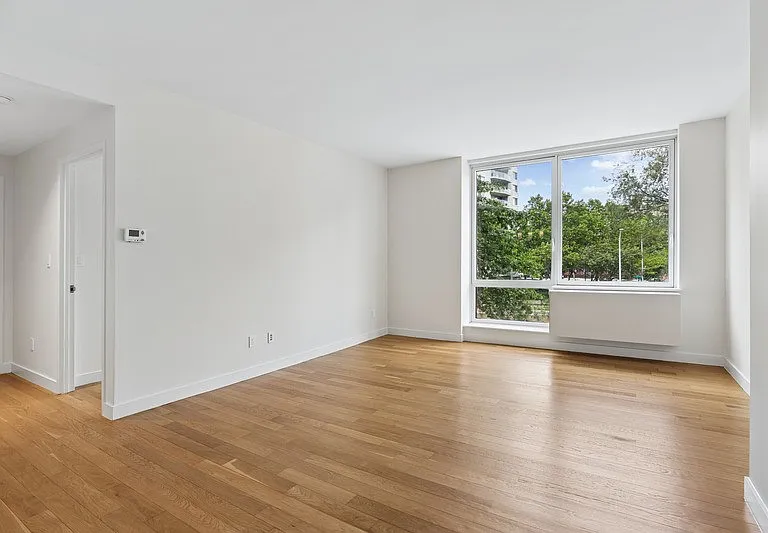 Elevate your lifestyle at Arbor with this spacious, sunlit living area featuring stunning views and modern finishes. Enjoy the blend of comfort and style in a vibrant community. Schedule your tour today and envision your new home!