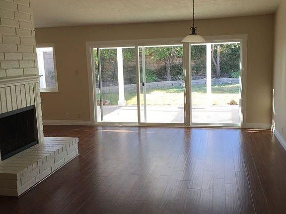 Living room with 1 year old flooring