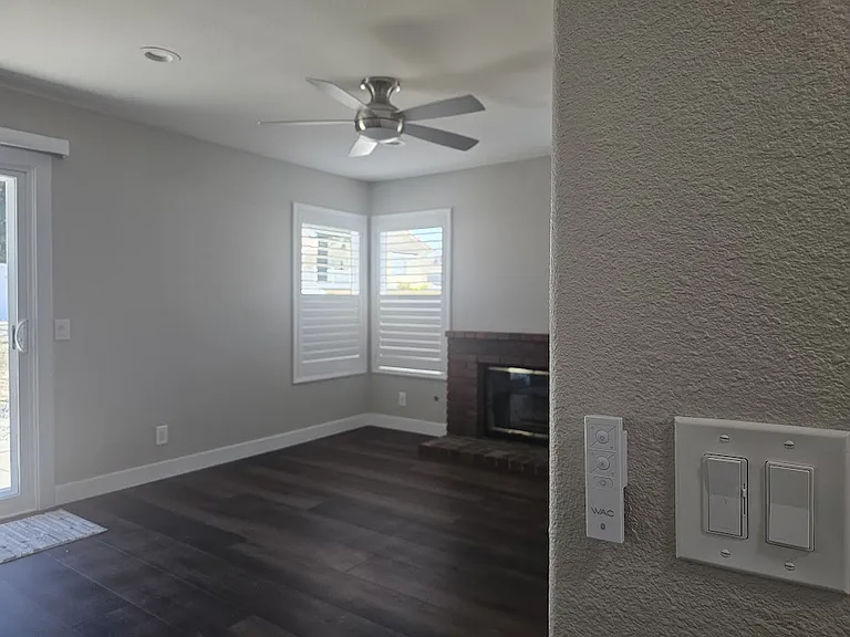 Fans in every room function with wall-mounted remotes. Dimmer switches for can lights