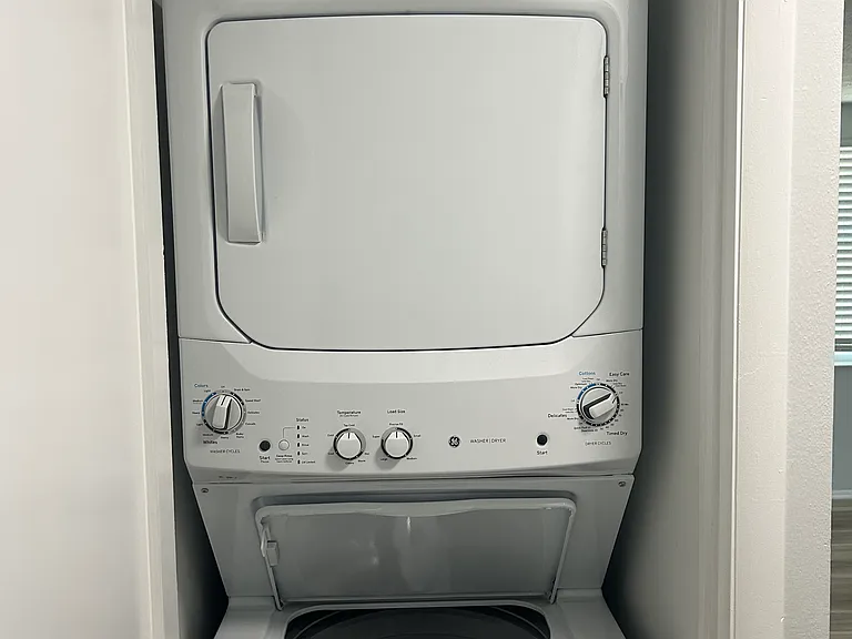 I unit stacked washer and dryer closet