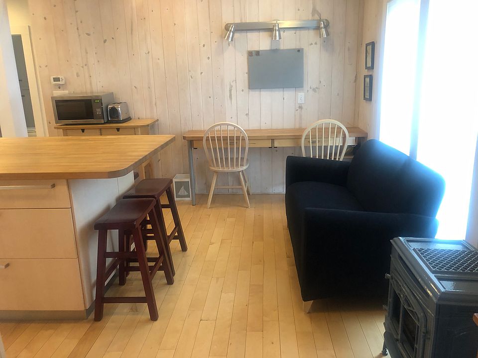 Cozy free standing gas fireplace, built in desk