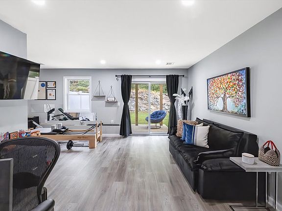 Potential 3rd Bedroom w 1/2 bath or family room with backyard access.