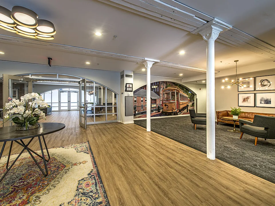 Modern fitness center with cardio equipment and dedicated resident wellness amenities