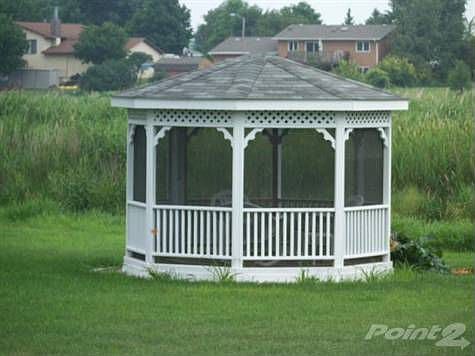 Gazebo in back yard overlooking nature area