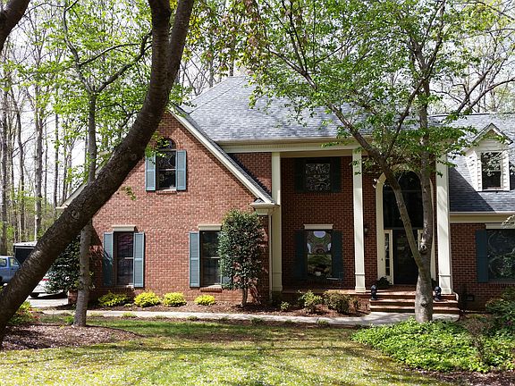 Front view with cherry trees