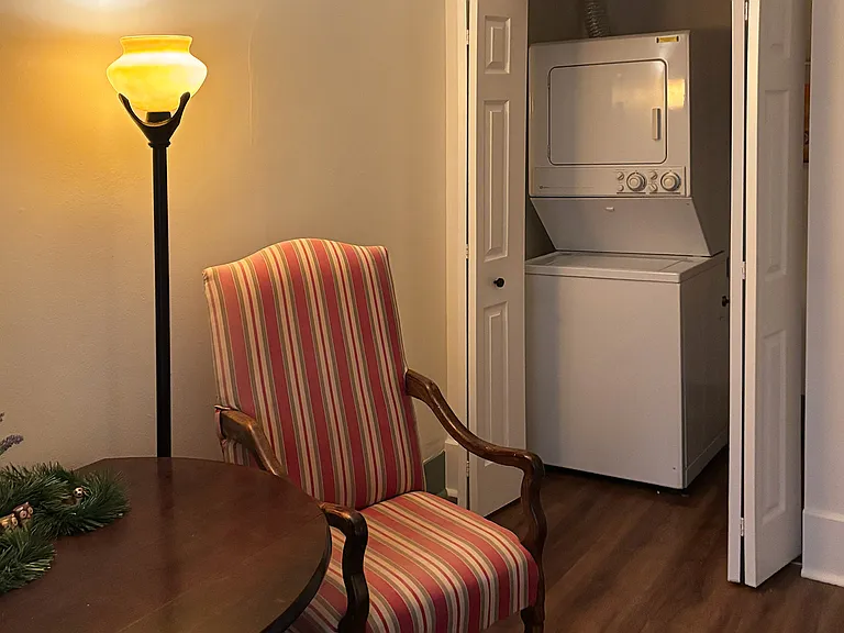 Lobby area with view of shared laundry closet.